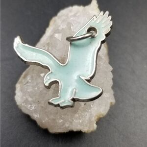 Eagle catching prey flying bird charm pendant. P151